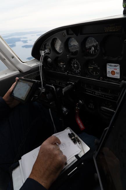 A pilot navigates a small aircraft over Vitória, BC, Canada, capturing cockpit controls and scenic views.