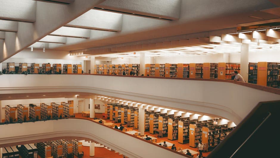 Explore the expansive, modern architecture of a Toronto library, showcasing multiple reading levels.