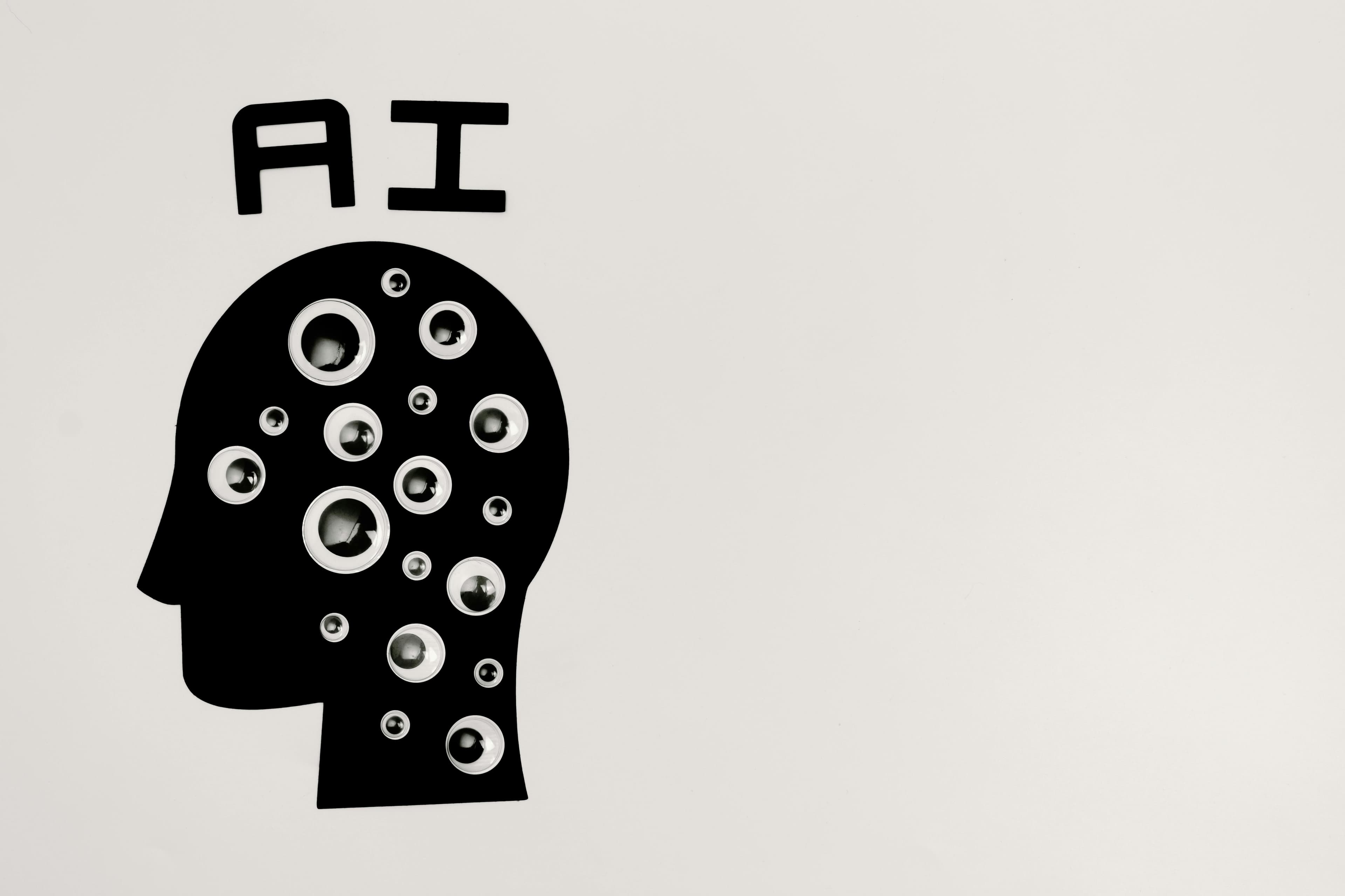 صورة إبداعية لفراشات تحلق فوق كلمة "AI" على خلفية باستيلية ناعمة، ترمز إلى الابتكار.